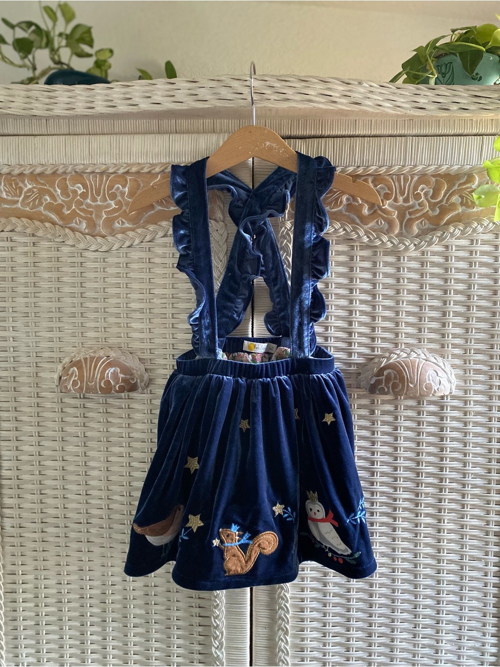 Baby Boden Navy Velvet Ruffled Suspender Skirt with Embroidered Forest Motifs